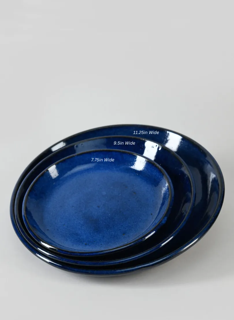 Falling Blue Ceramic Saucers